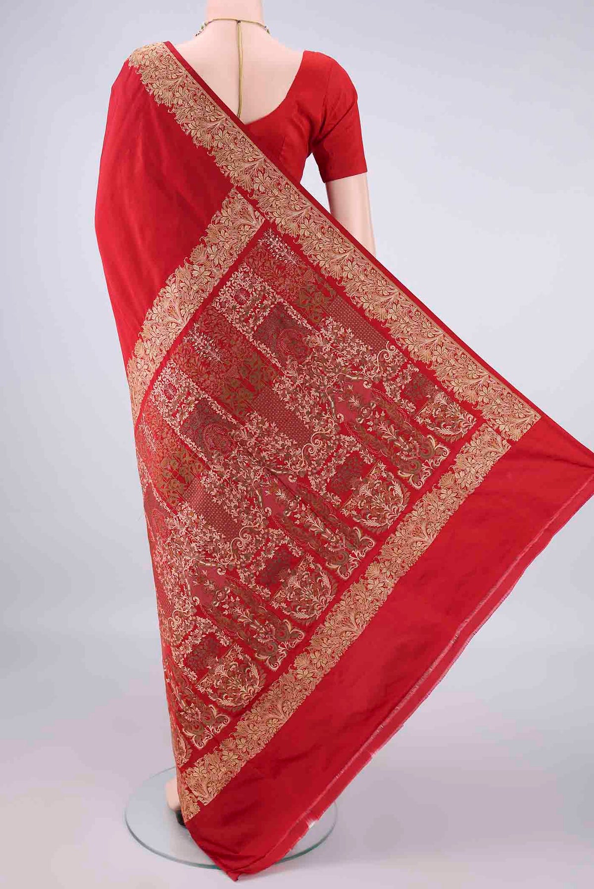 Flat view of Red Banarasi Jamavar Saree with Plain Body and Thread Border. 