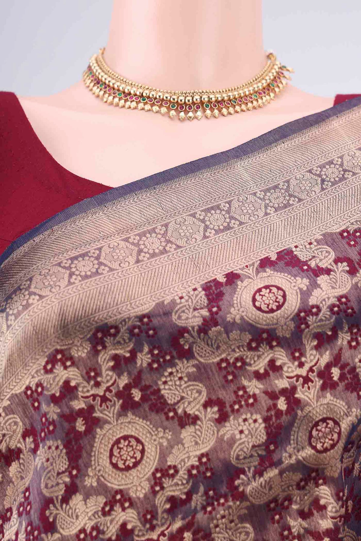 Border image of Burgundy Banarasi Saree with Zari Brocade on the body and Zari Border. 