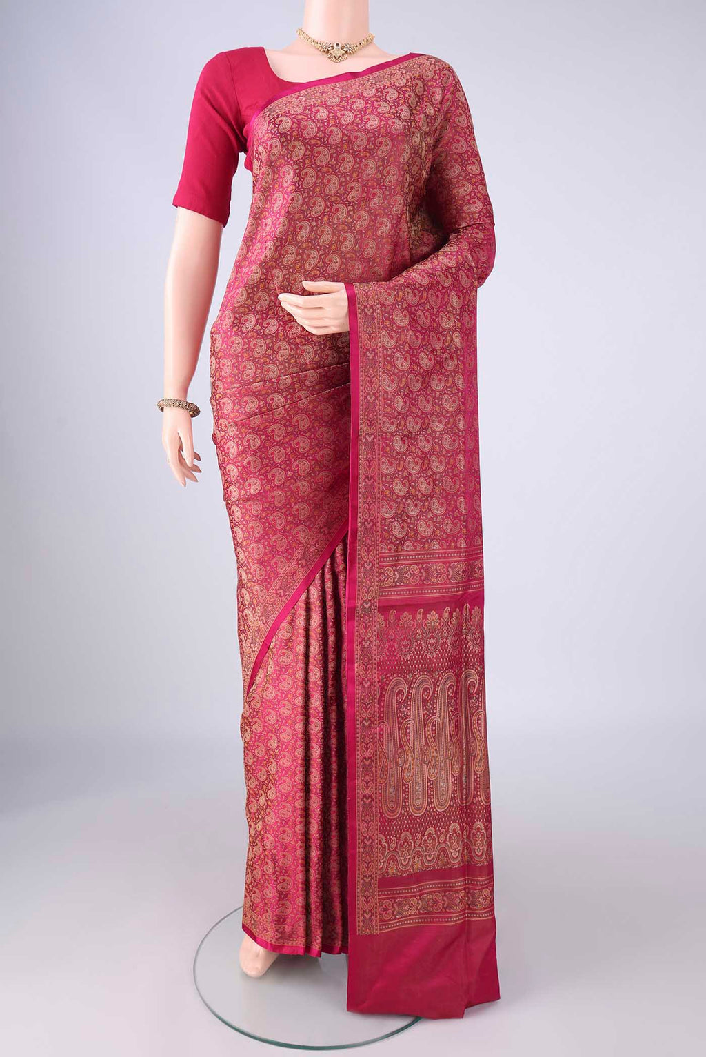 Rani Pink Banarasi Tanchoi Silk Saree with Jacquard With Thread Butta on the body and Thread Border.  displayed on a mannequin