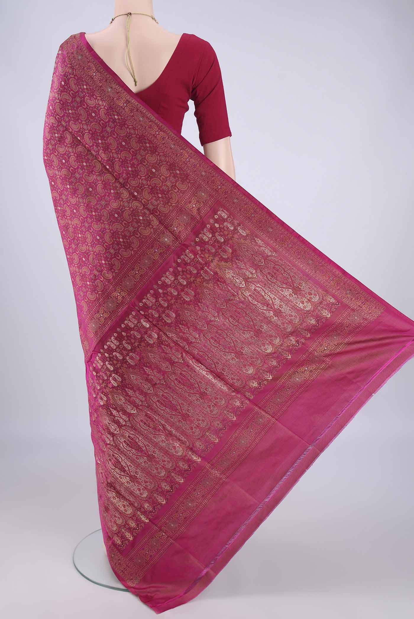 Flat view of Rani Pink Banarasi Tanchoi Silk Saree with Jacquard With Thread Butta on the body and Thread Border. 