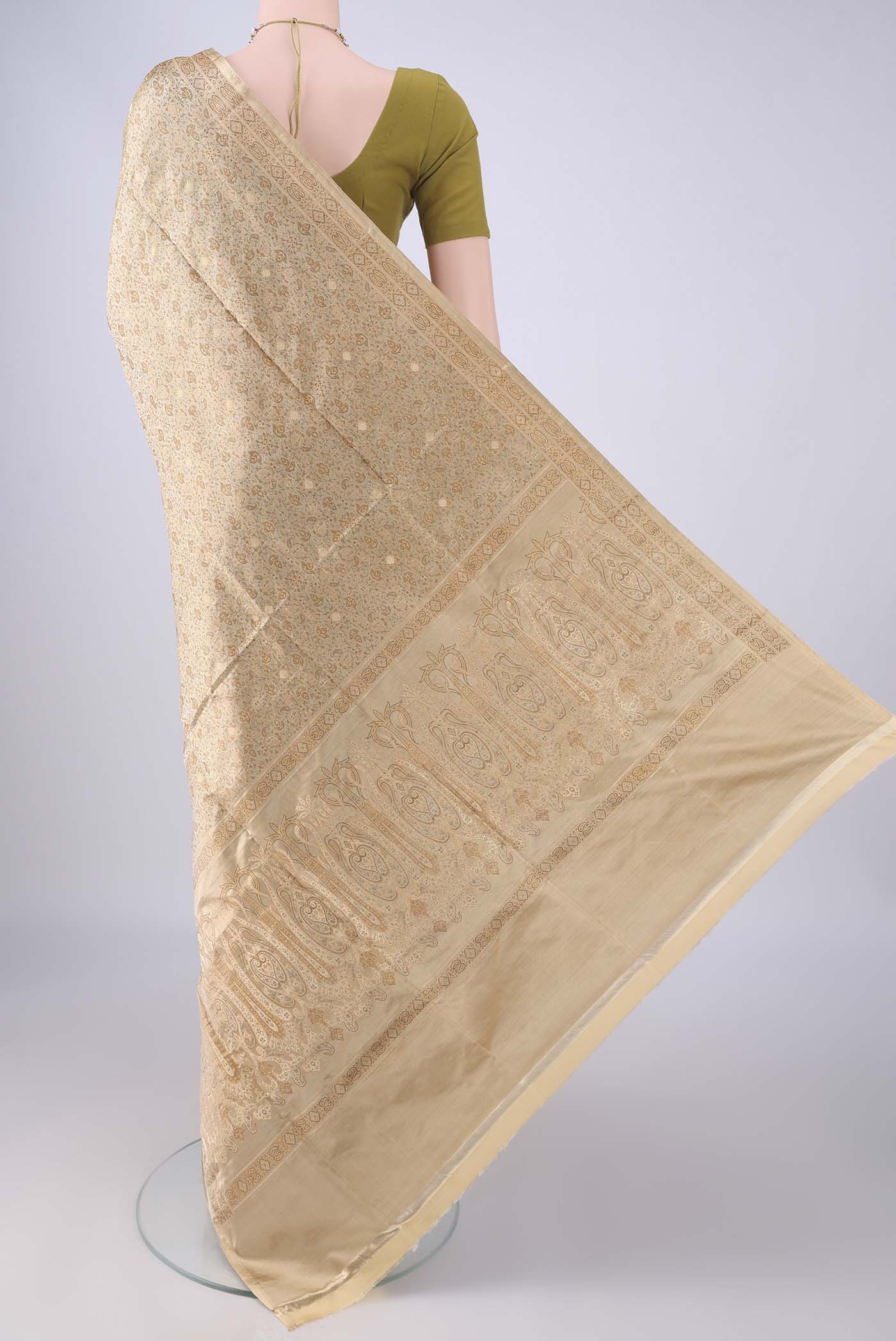 Flat view of Beige Banarasi Tanchoi Silk Saree with Jacquard With Thread Butta on the body and Thread Border. 
