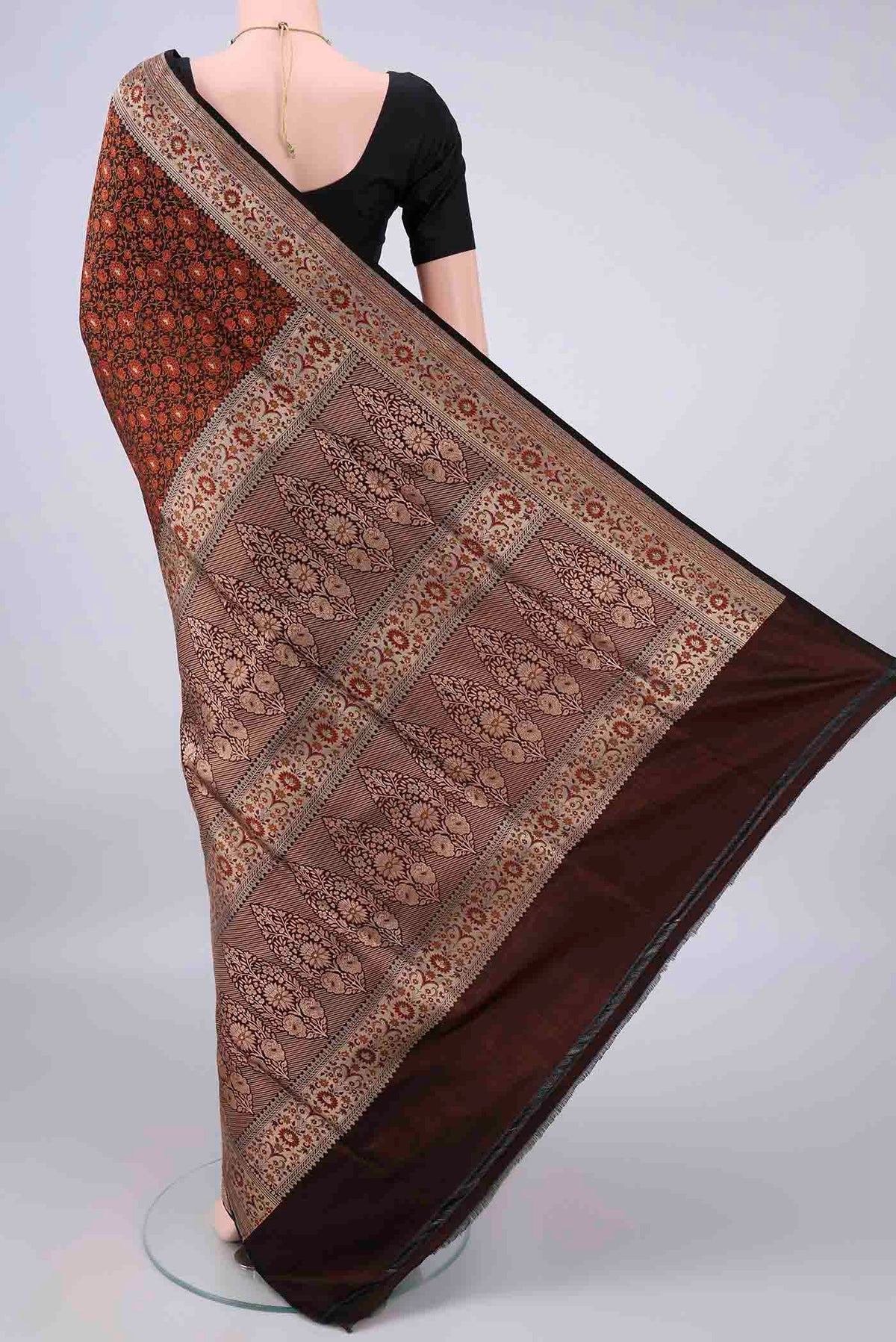 Flat view of Pure Silk Black Banarasi Tanchoi Saree with Thread Brocade on the body and Zari Border. 