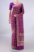 Pure Silk Purple Banarasi Tanchoi Saree with Jacquard With Zari Butta on the body and Zari Border.  displayed on a mannequin
