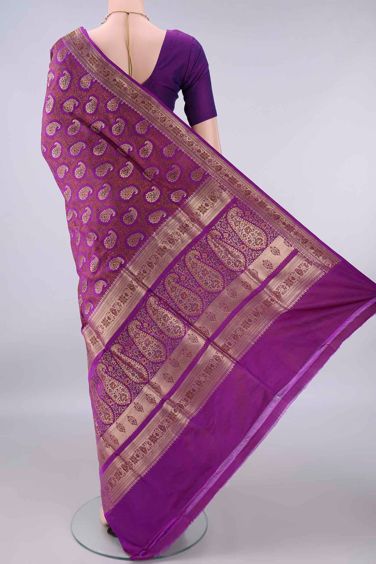Flat view of Pure Silk Purple Banarasi Tanchoi Saree with Jacquard With Zari Butta on the body and Zari Border. 