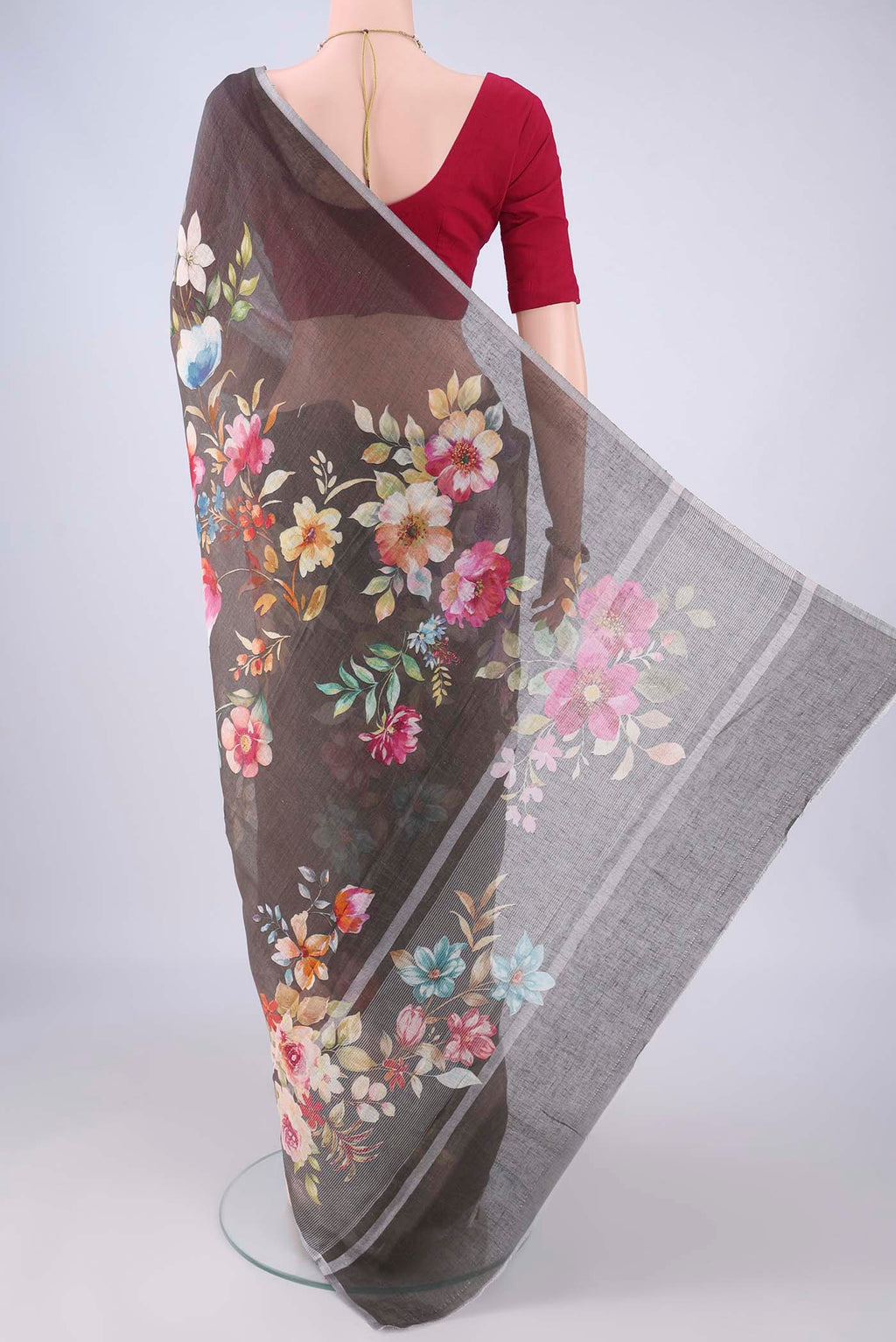 Flat view of Pure Silk Davys Grey Linen Saree with Floral Print on the body and Zari Border. 