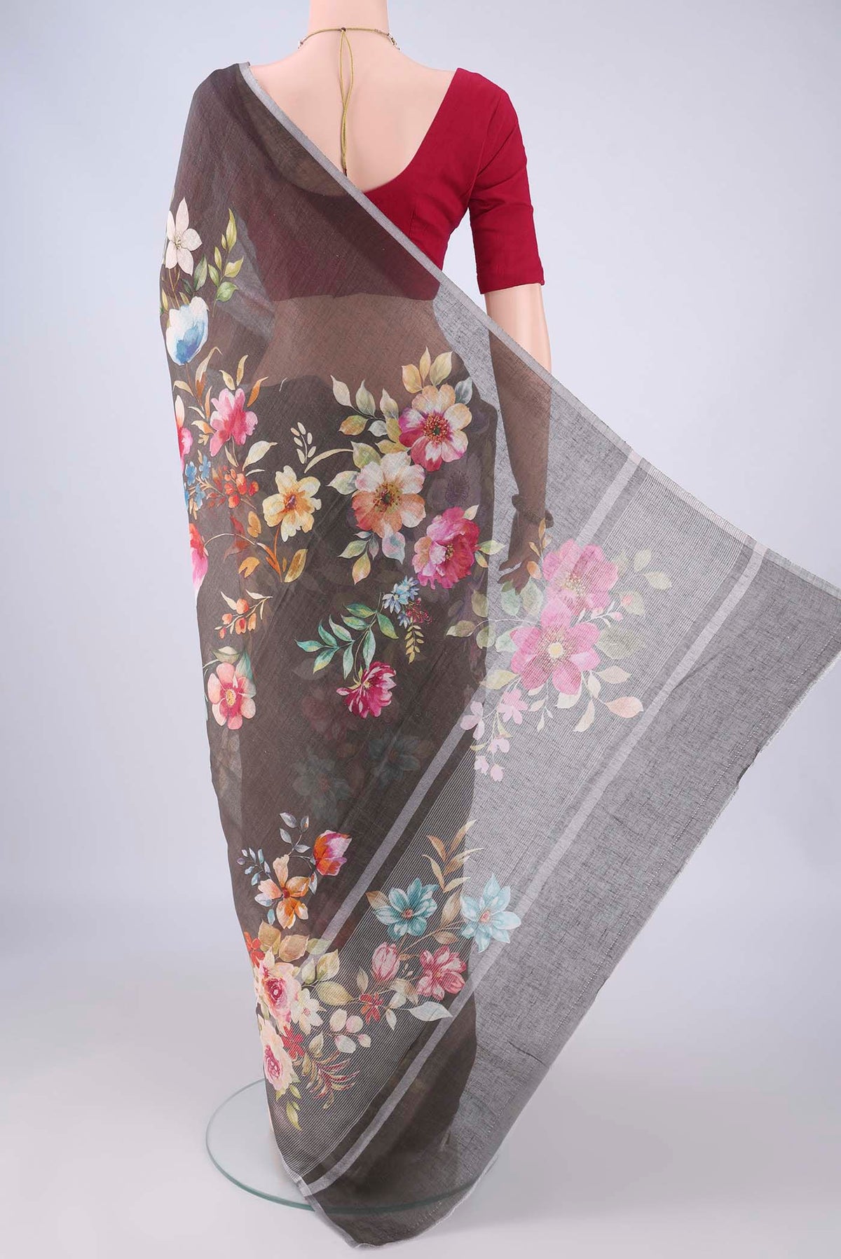 Flat view of Pure Silk Davys Grey Linen Saree with Floral Print on the body and Zari Border. 