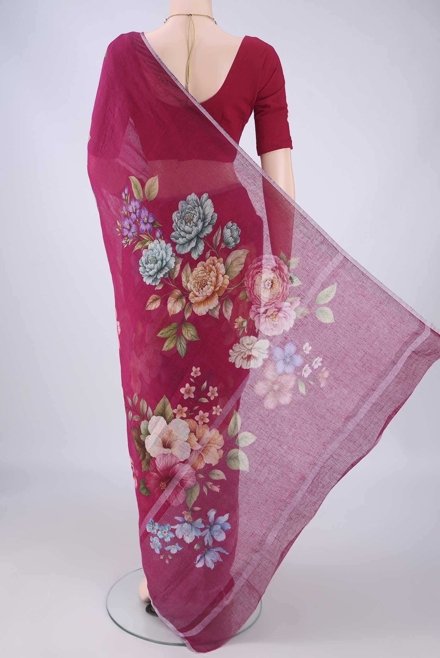 Flat view of Dark Pink Linen Saree with Floral Print on the body and Zari Border. 