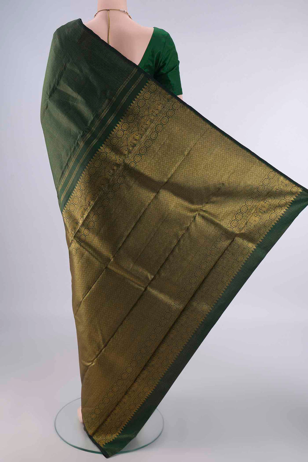 Flat view of Pure Silk Bottle Green Kanjivaram Saree with Checked design on the body and Without Border. 