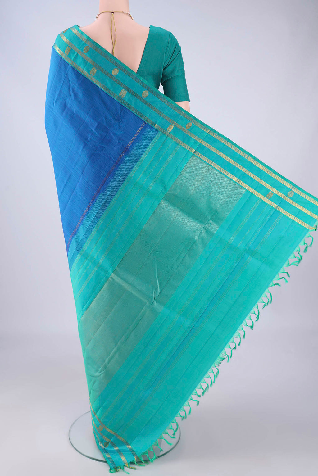 Flat view of Royal Blue Kanchipuram Silk Saree with Plain Body and Zari Border. 
