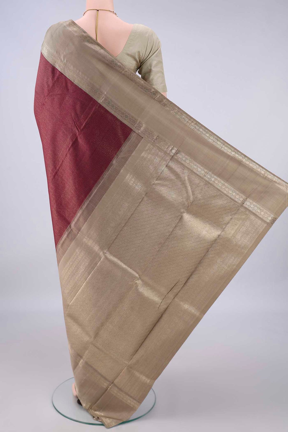 Flat view of Pure Silk Maroon Kanchipuram Saree with Checked design on the body and Zari Border. 