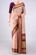 Pure Silk Sandal Kanjivaram Saree with Thread Butta on the body and Zari Border.  displayed on a mannequin
