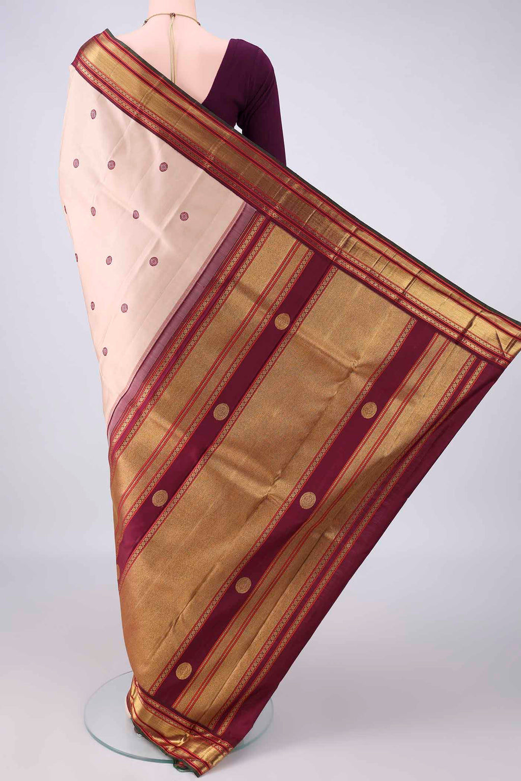 Flat view of Pure Silk Sandal Kanjivaram Saree with Thread Butta on the body and Zari Border. 