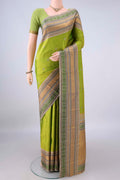 Pure Silk Light Green Kanjivaram Saree with Thread Butta on the body and Thread Border.  displayed on a mannequin