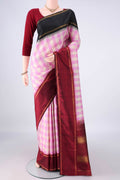 Pure Silk Rose pink Kanjivaram Saree with Checked design on the body and Ganga Jamuna Border.  displayed on a mannequin