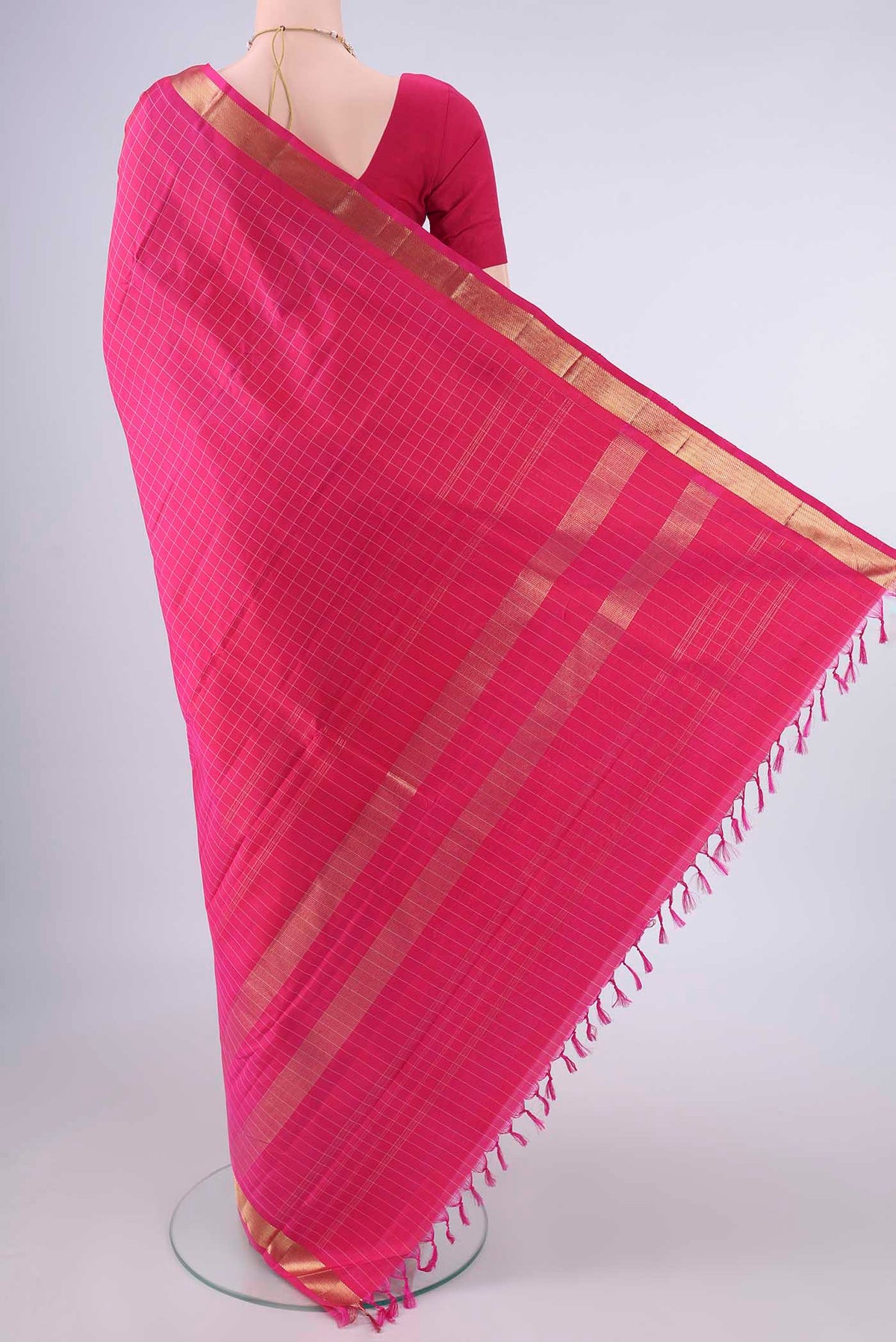 Flat view of Pure Silk Pink Kanjivaram Saree with Checked design on the body and Zari Border. 