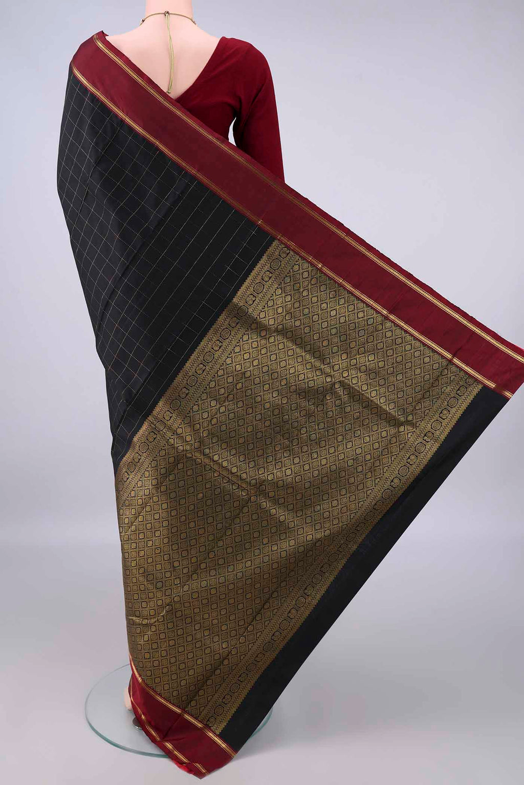 Flat view of Pure Silk Black Kanchipuram Saree with Checked design on the body and Plain Border. 