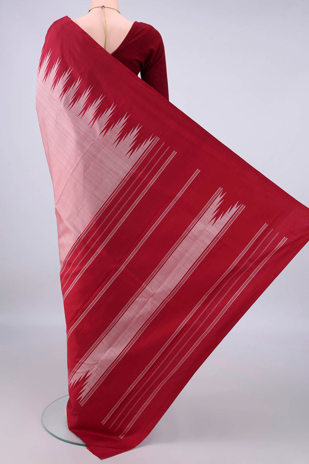 Flat view of Pure Silk Peach Kanchipuram Saree with Plain Body and Temple Border. 