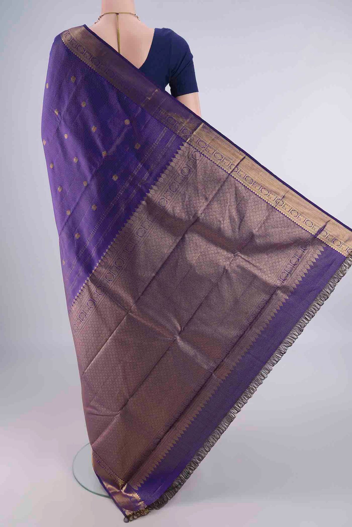 Flat view of Pure Silk Royal Blue Dual Tone Kanjivaram Saree with Zari Butta on the body and Zari Border. 