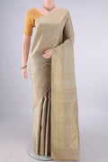 Pure Silk Pure Zari Beige Kanjivaram Saree with Checked design on the body and Thin Zari Line.  displayed on a mannequin