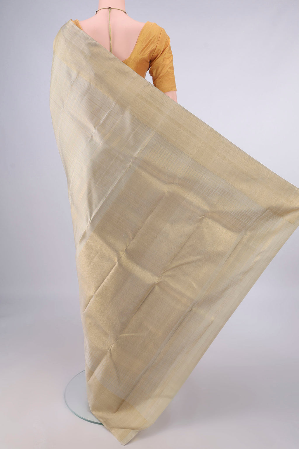 Flat view of Pure Silk Pure Zari Beige Kanjivaram Saree with Checked design on the body and Thin Zari Line. 