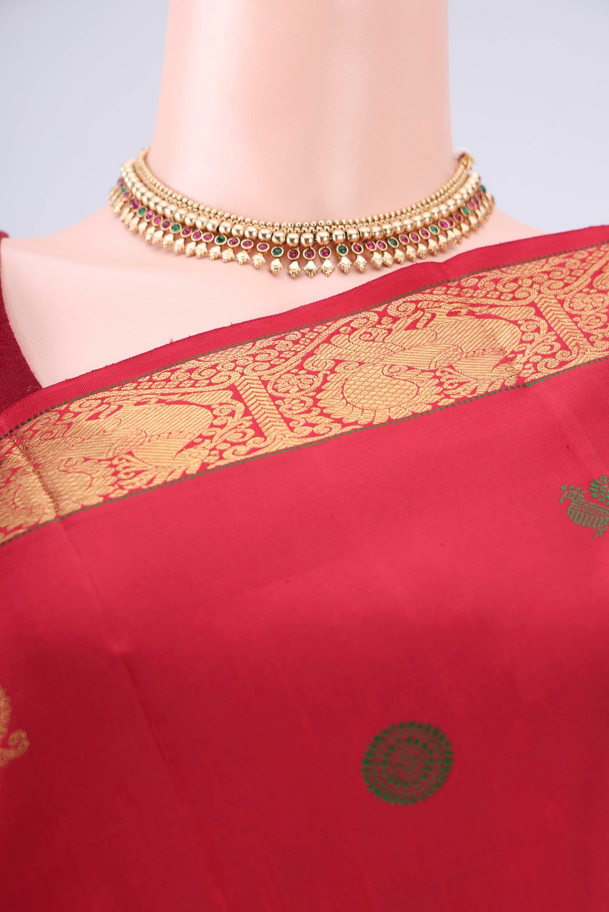 Border image of Pure Silk Pure Zari Red Kanjivaram Saree with Zari And Thread Butta on the body and Zari Border. 