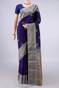 Pure Silk Navy Blue Kanchipuram Saree with Zari Butta on the body and Zari Border.  displayed on a mannequin