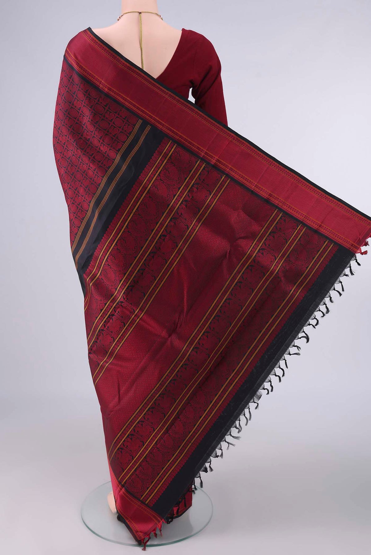 Flat view of Pure Silk Black Kanjivaram Saree with Thread Brocade on the body and Thread Border. 