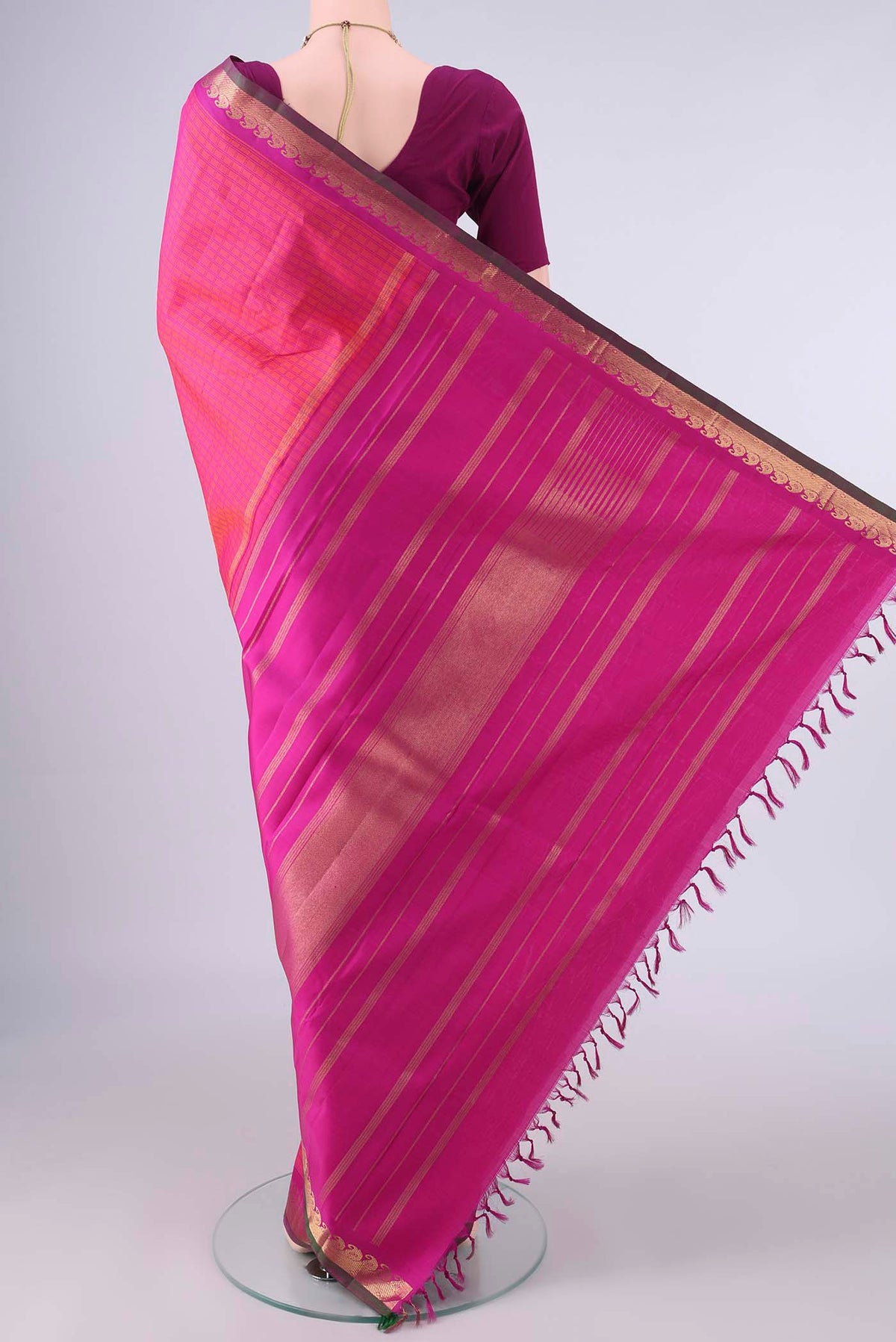 Flat view of Pure Silk Coral Kanchipuram Saree with Checked design on the body and Zari Border. 