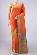 Pure Silk Pure Zari Orange Kanjivaram Saree with Zari Butta on the body and Zari Border.  displayed on a mannequin