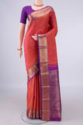 Pure Silk Brick Orange Kanjivaram Saree with Checked design on the body and Zari Border.  displayed on a mannequin