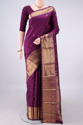 Pure Silk Pure Zari Purple Kanjivaram Saree with Zari Butta on the body and Zari Border.  displayed on a mannequin