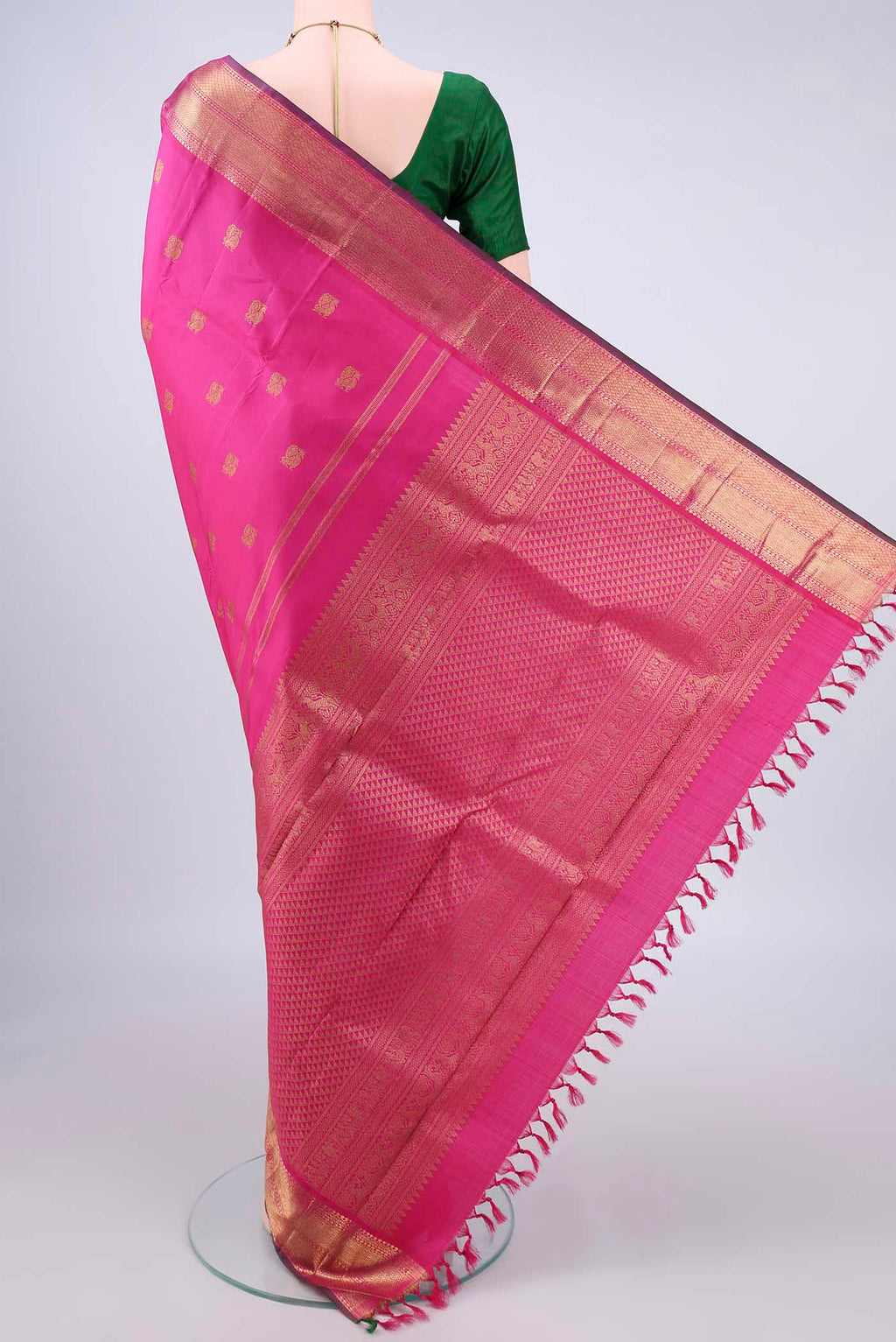 Flat view of Pure Silk Pure Zari Pink Kanjivaram Saree with Zari Butta on the body and Zari Border. 