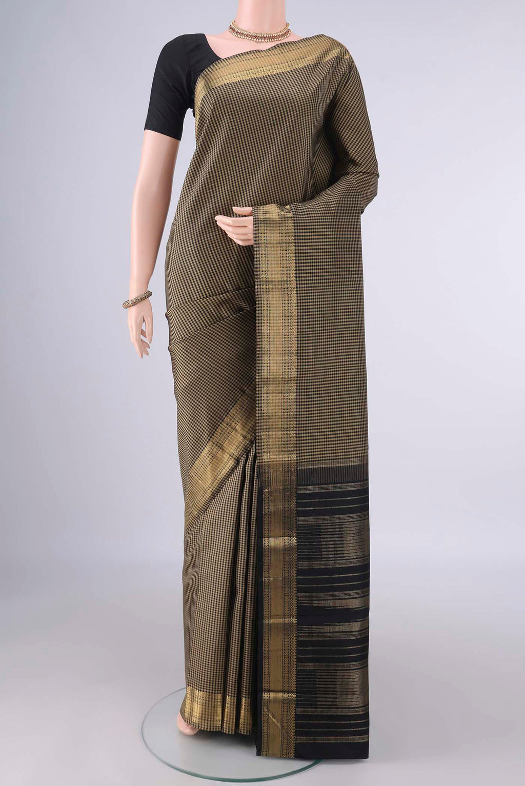 Pure Silk Multi Color Kanjivaram Saree with Checked design on the body and Zari Border.  displayed on a mannequin