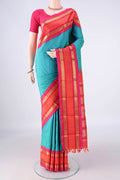 Pure Silk Pure Zari Turquoise Kanjivaram Saree with Checked design on the body and Thin Zari Line.  displayed on a mannequin