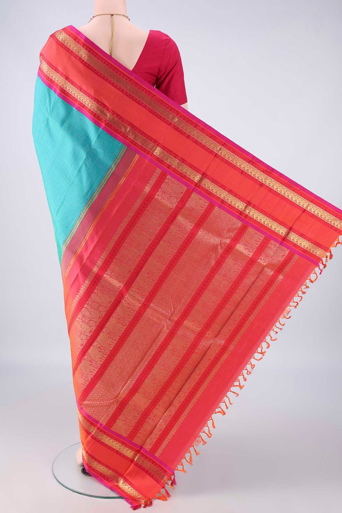 Flat view of Pure Silk Pure Zari Turquoise Kanjivaram Saree with Checked design on the body and Thin Zari Line. 
