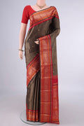 Pure Silk Brown Dual Tone Kanjivaram Saree with Zari Butta on the body and Zari Border.  displayed on a mannequin