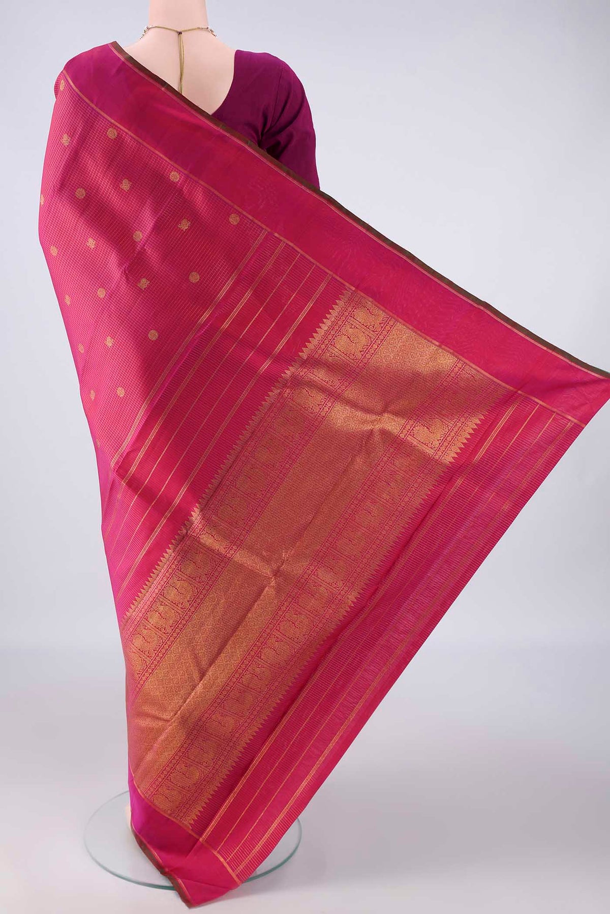 Flat view of Pure Silk Pure Zari Pink Kanjivaram Saree with Checked design on the body and Zari Border. 