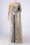 Pure Silk Pure Zari Grey Kanjivaram Saree with Checked design on the body and Zari Border.  displayed on a mannequin