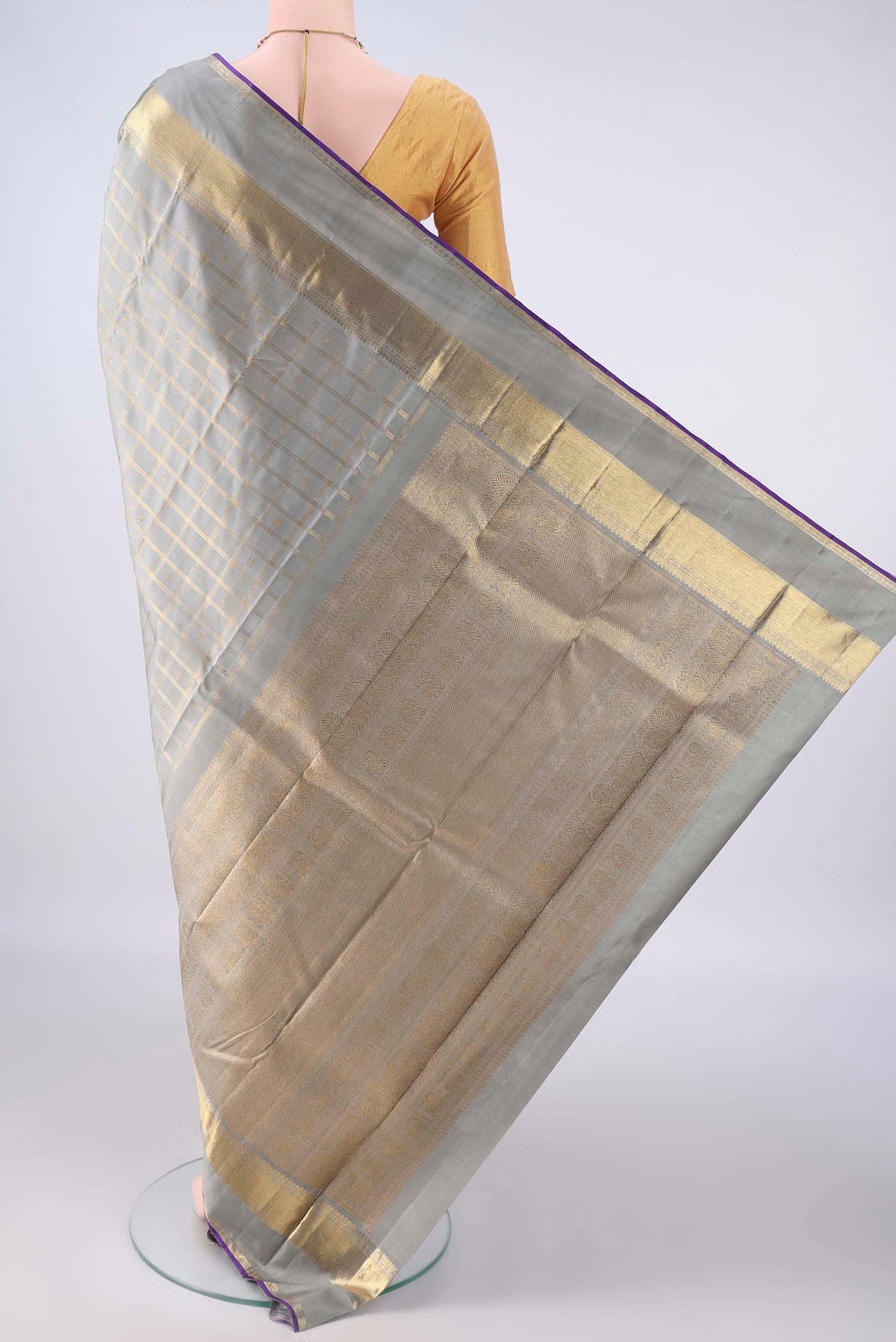 Flat view of Pure Silk Pure Zari Grey Kanjivaram Saree with Checked design on the body and Zari Border. 