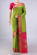 Pure Silk Pure Zari Parrot Green Kanjivaram Saree with Zari Butta on the body and Zari Border.  displayed on a mannequin