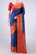Pure Silk Pure Zari Peacock Blue Kanjivaram Saree with Zari Butta on the body and Zari Border.  displayed on a mannequin