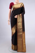 Pure Silk Pure Zari Coffee Brown Kanjivaram Saree with Zari Butta on the body and Zari Border.  displayed on a mannequin