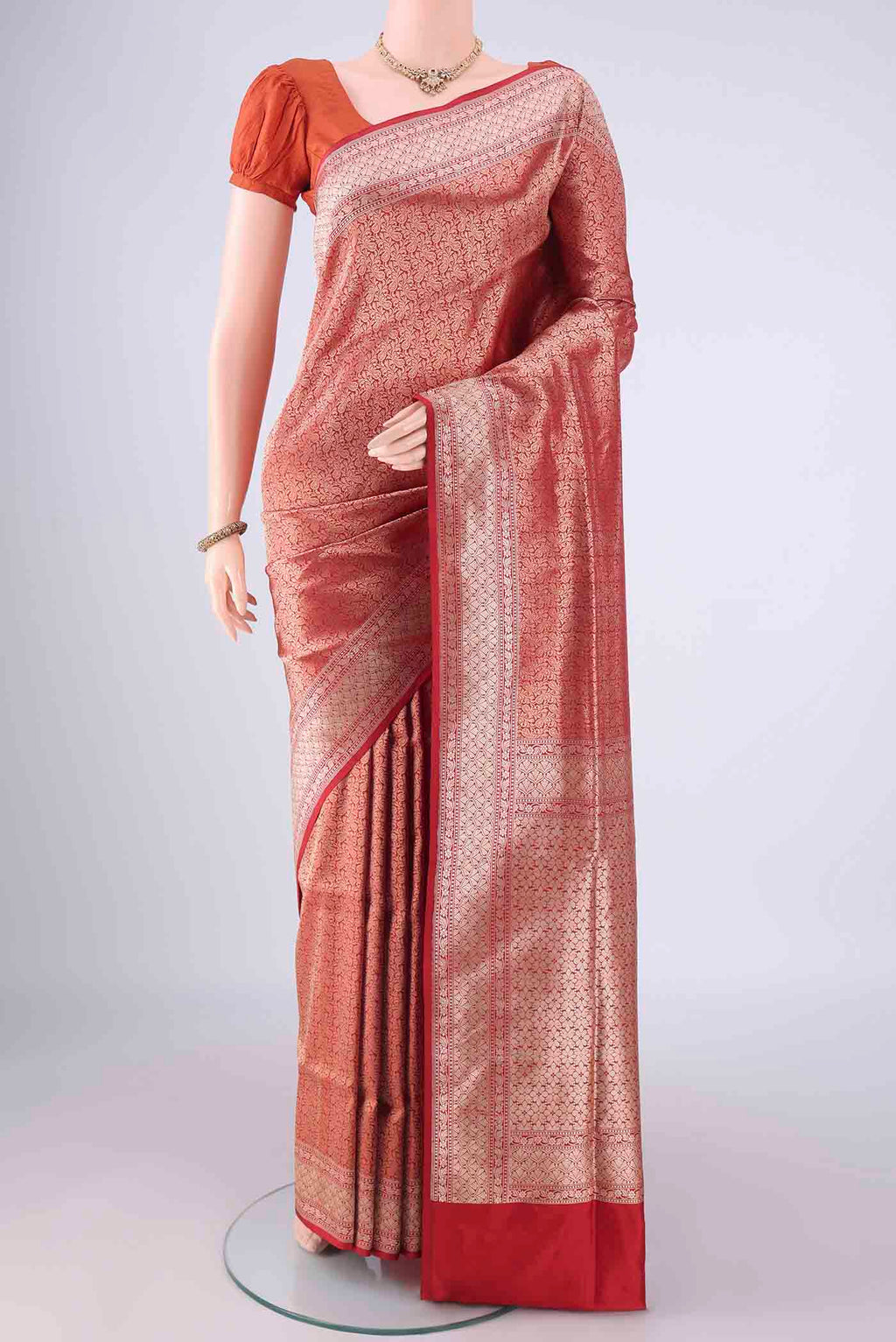 Red Banarasi Silk Saree with Zari Brocade on the body and Zari Border.  displayed on a mannequin