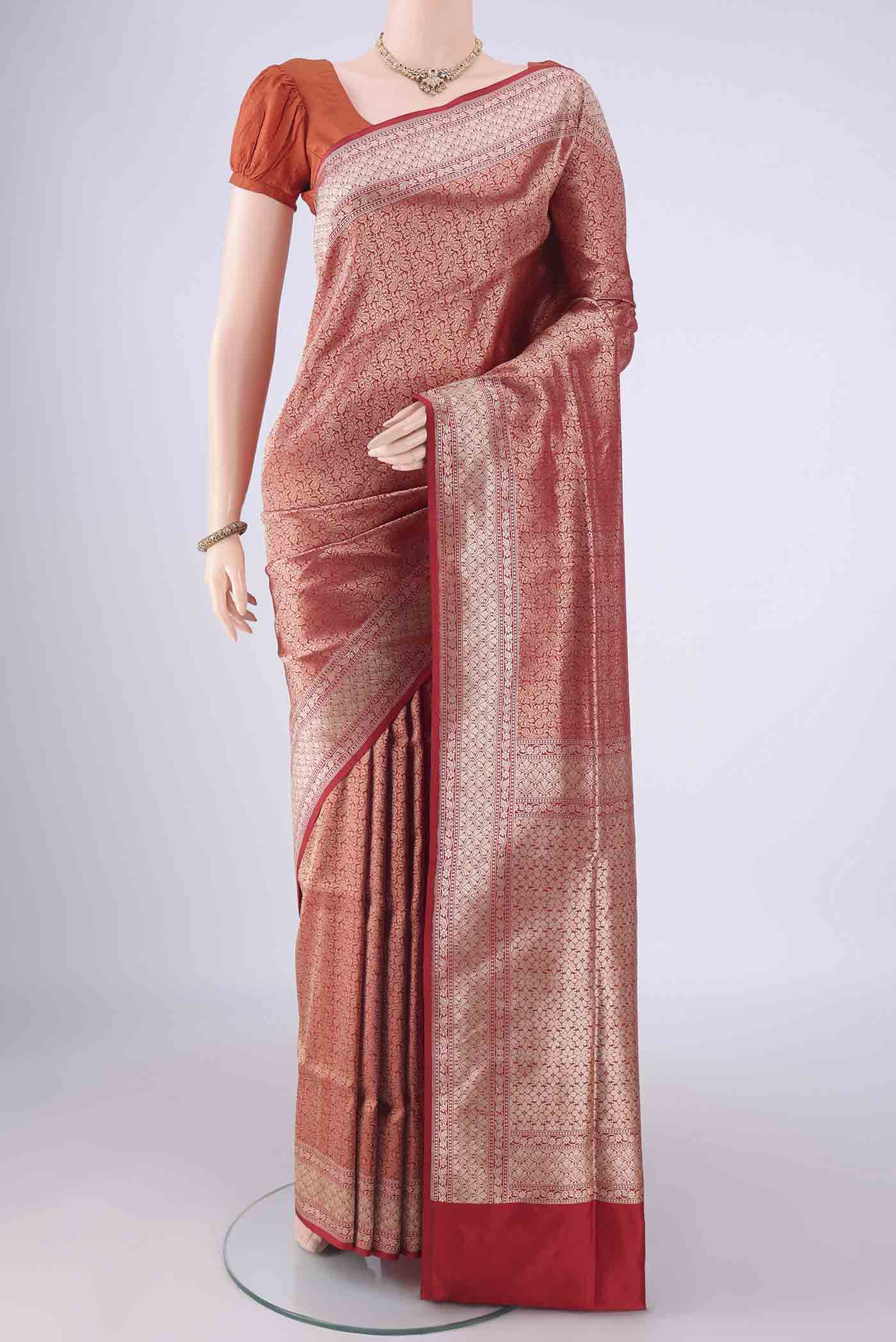 Red Banarasi Silk Saree with Zari Brocade on the body and Zari Border.  displayed on a mannequin