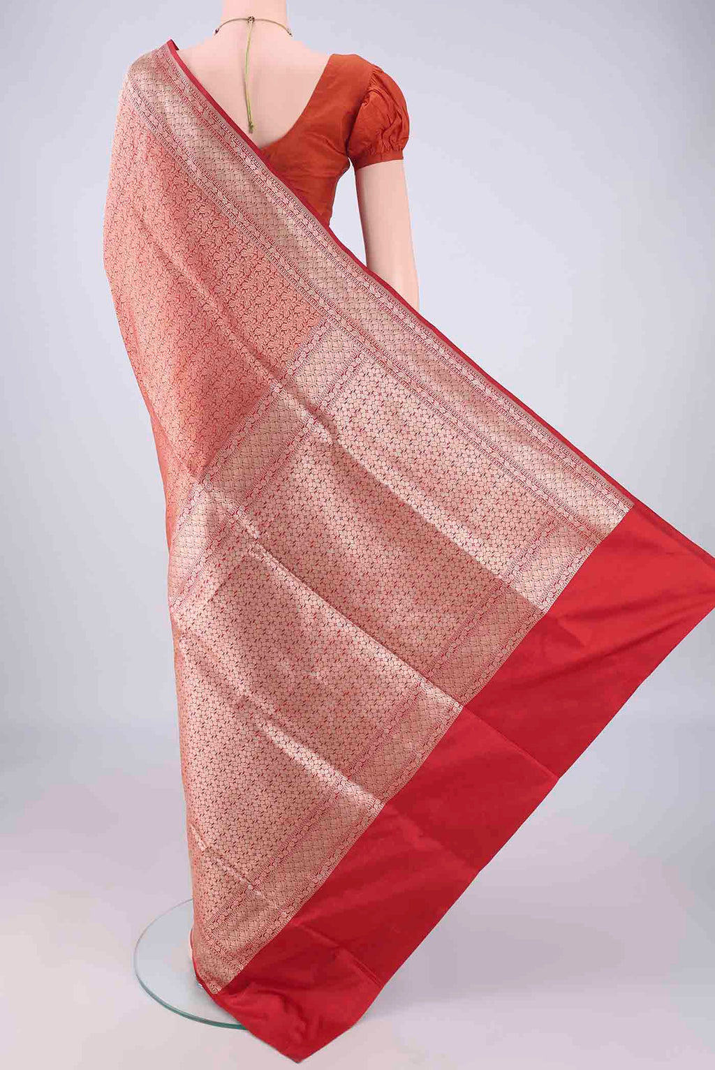 Flat view of Red Banarasi Silk Saree with Zari Brocade on the body and Zari Border. 