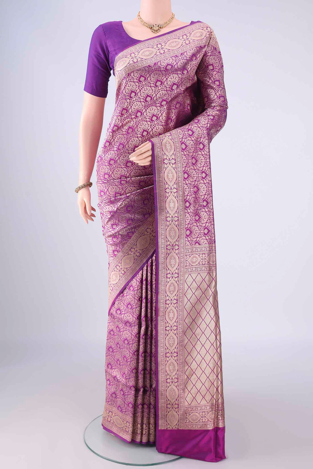 Purple Banarasi Silk Saree with Zari Brocade on the body and Zari Border.  displayed on a mannequin