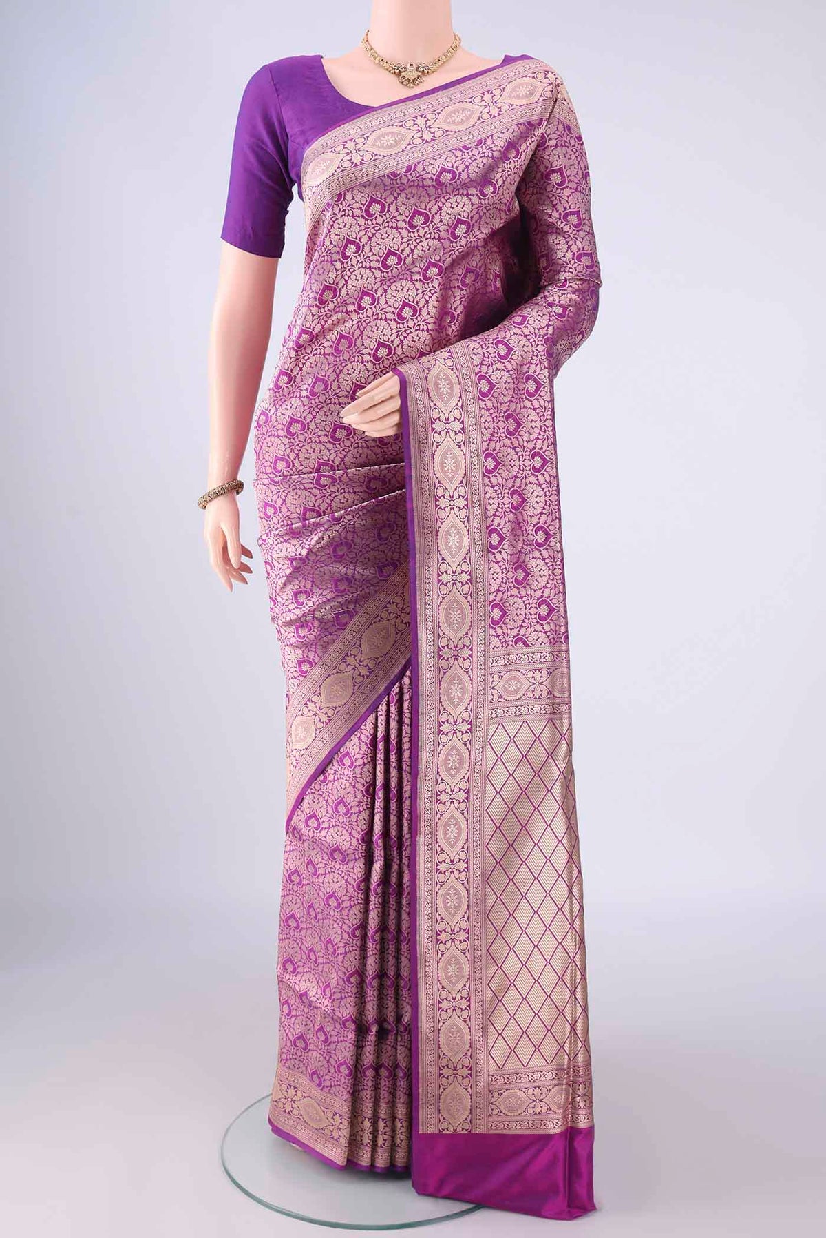 Purple Banarasi Silk Saree with Zari Brocade on the body and Zari Border.  displayed on a mannequin