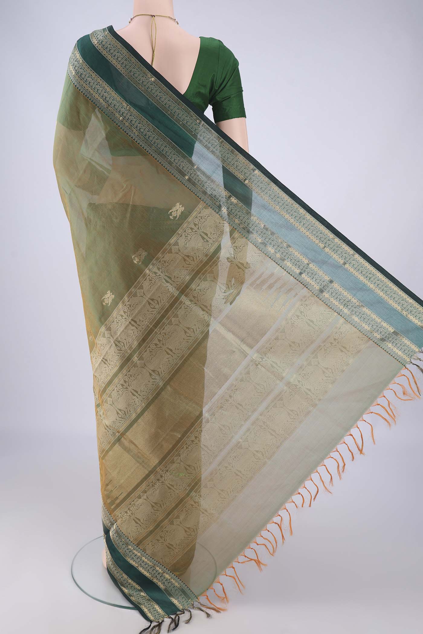 Flat view of Light Green Dual Tone Coimbatore Silk Cotton Saree with Zari Butta on the body and Zari And Thread Border. 
