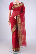 Deep Red Coimbatore Silk Cotton Saree with Zari Butta on the body and Zari Border.  displayed on a mannequin