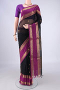 Black Coimbatore Silk Cotton Saree with Zari Butta on the body and Zari Border.  displayed on a mannequin